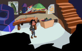 Screenshot from Day of the Sandwich. *Very* Day of the Tentacle-like graphics. The main character, Delphine, is standing under a hanging light in the basement of her home. There's an arcade cabinet, a wooden table, tools, posters, and more in the background.